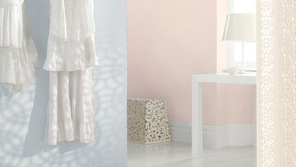 Take advantage of the natural light and go for pale tones that will bounce light back into the room, creating a bright, airy feel