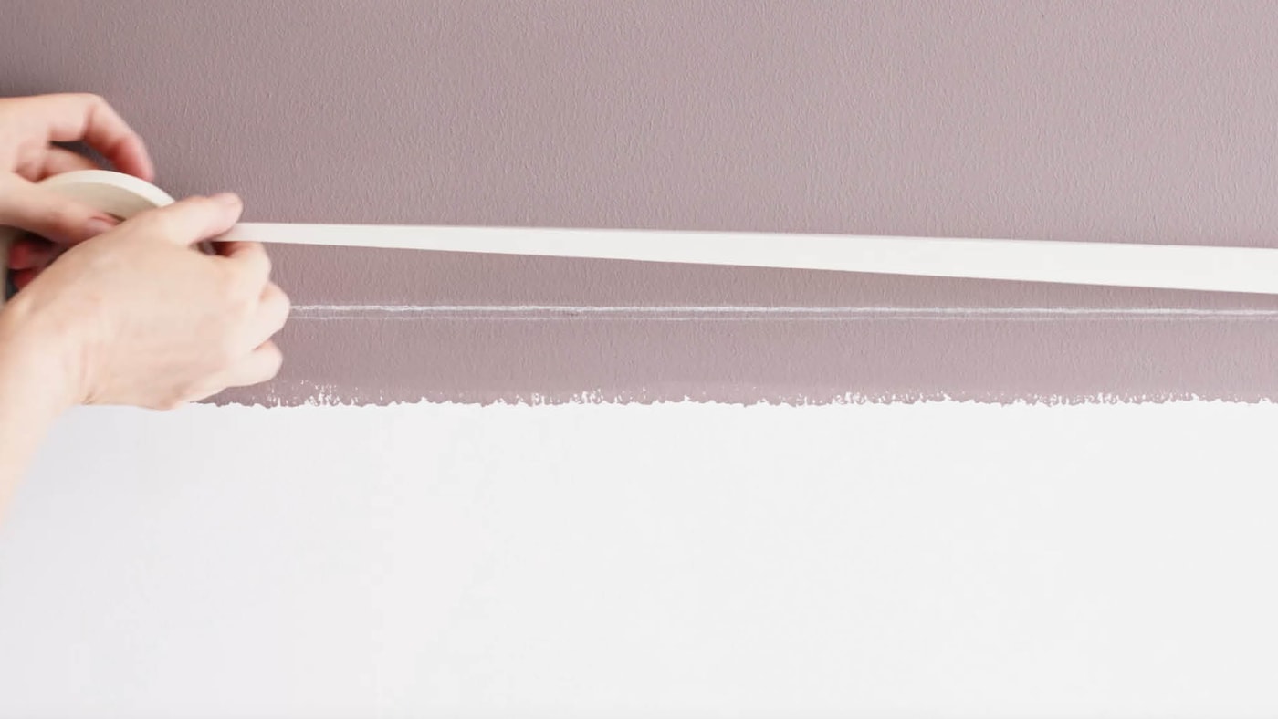 Apply masking tape along your chalked line when your paint is dry