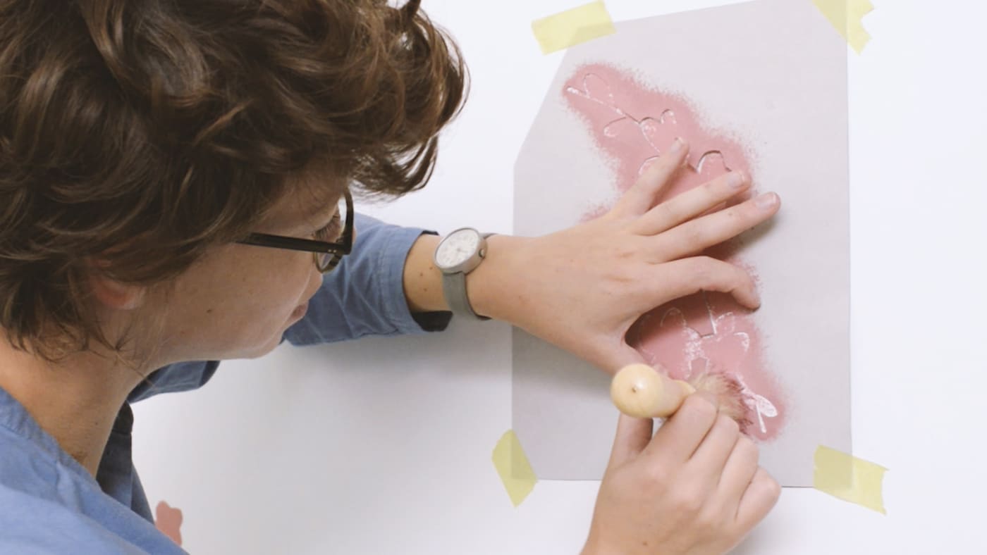 Applying paint to stencil