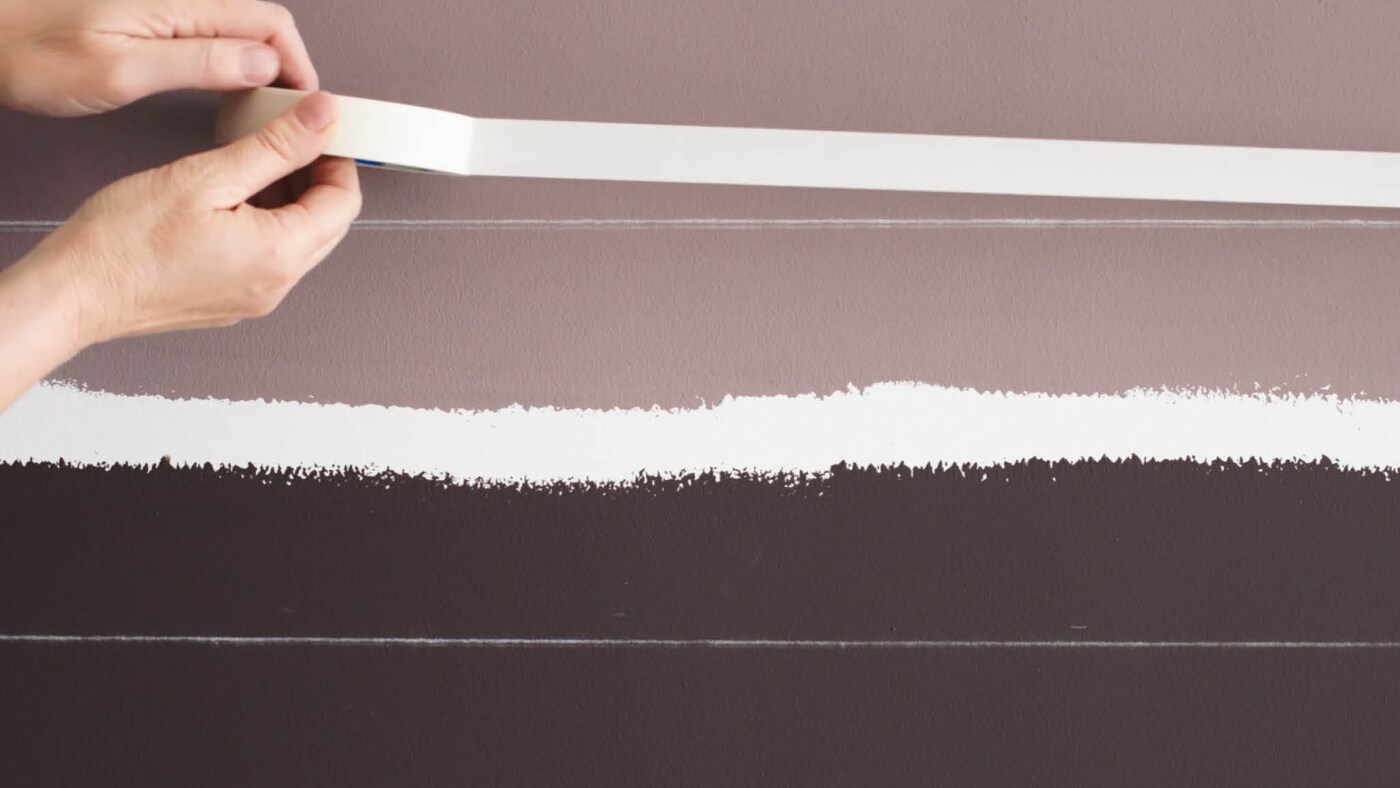 Apply masking tape along your chalked lines