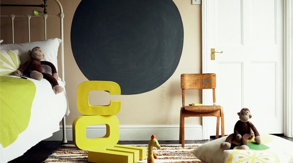 Warm neutrals mixed with splashes of colour creates a bedroom that boys and girls will love.  