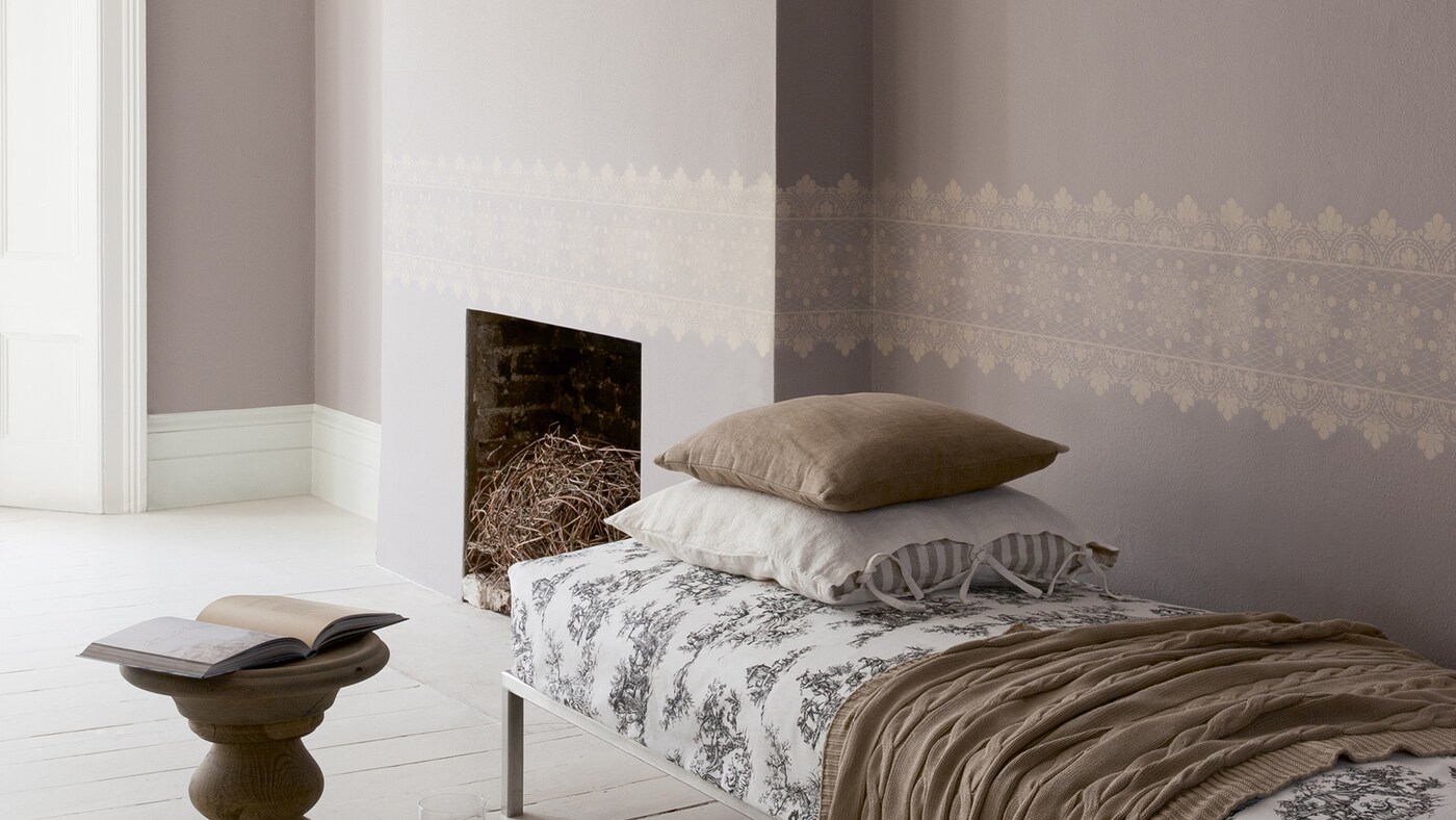 A living room decorated in warm shades of chocolate brown. 