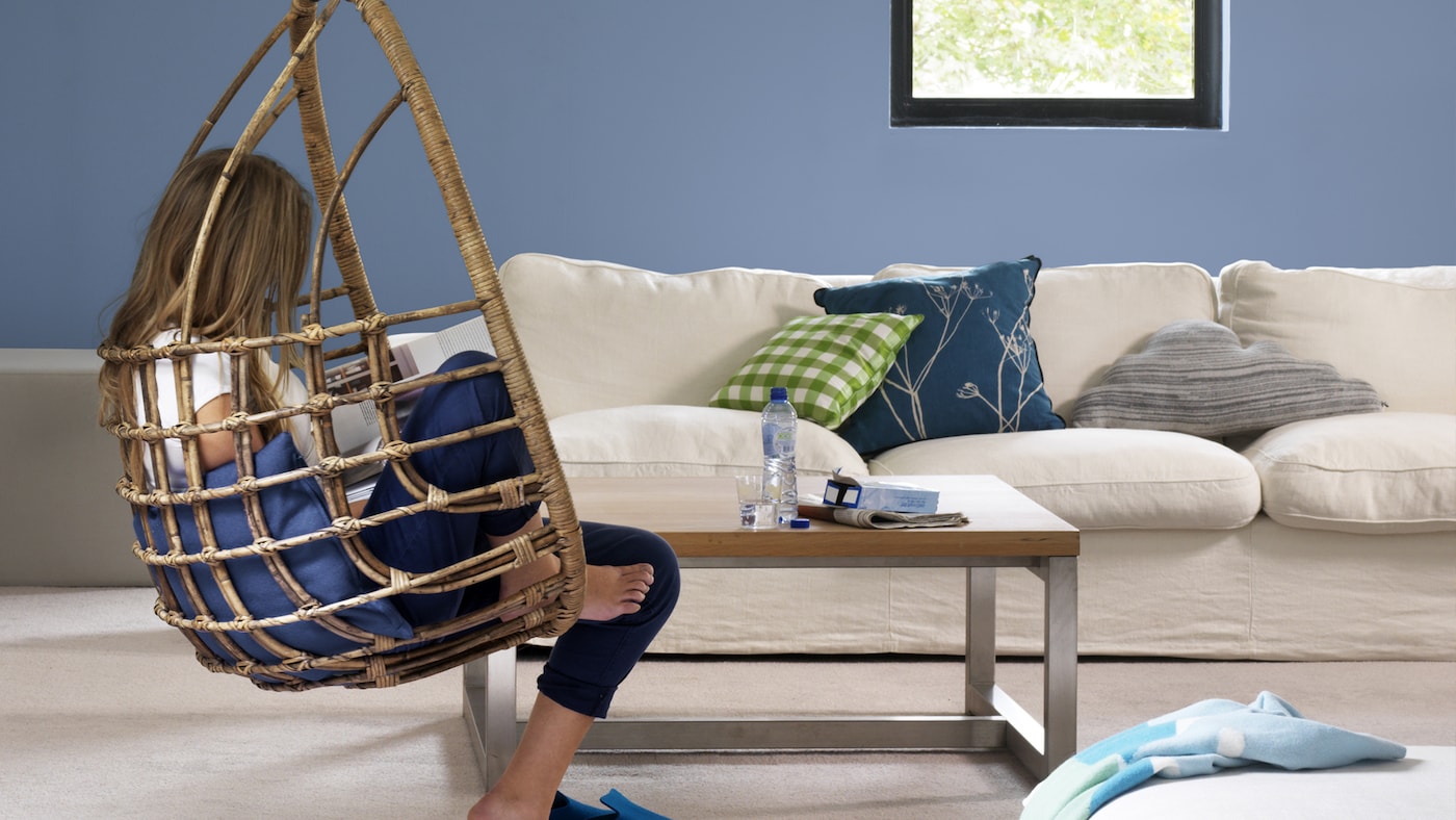 Relaxing in a stress-free blue living room. 