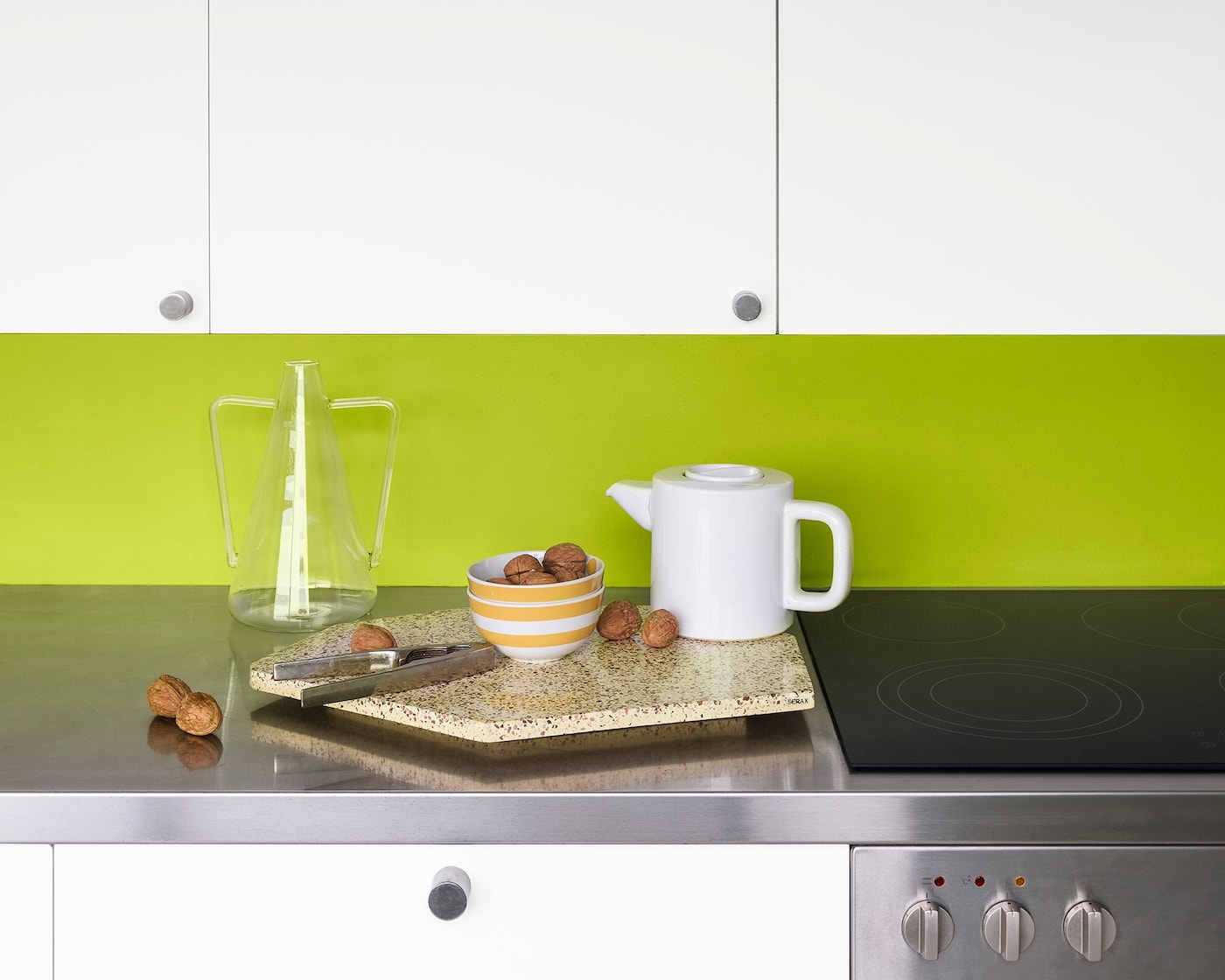 Cut through the clean white walls of a kitchen with a daring dash of lime
