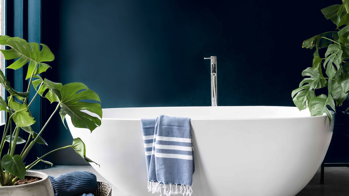 A bold yet tranquil bathroom created with the Dulux Ambiance Atmospheric color palette