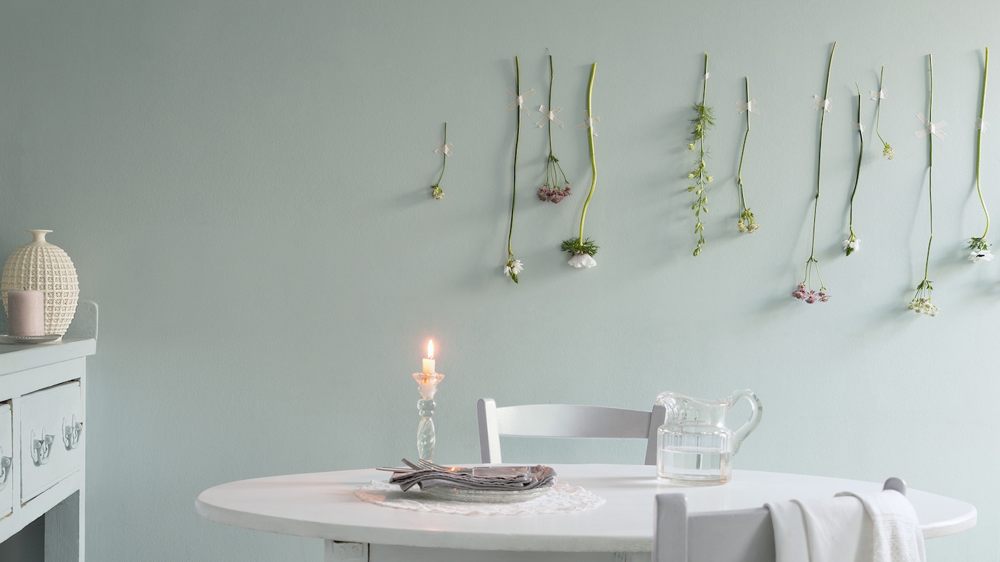 For a stylish dining room that suits every occasion, decorate with soft shades of green and classic accessories.  