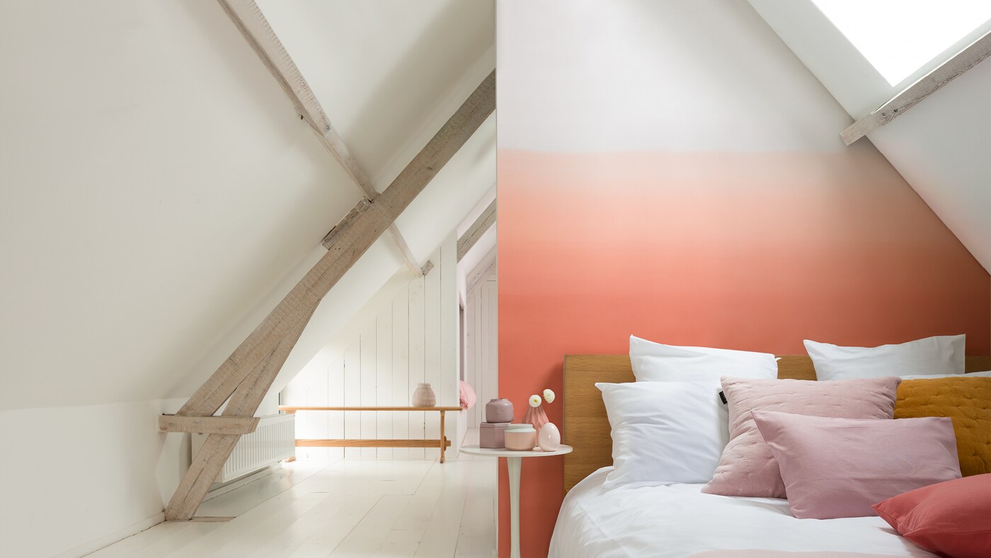 Create a restful breakout space with an accent colour painted fading into a neutral base.