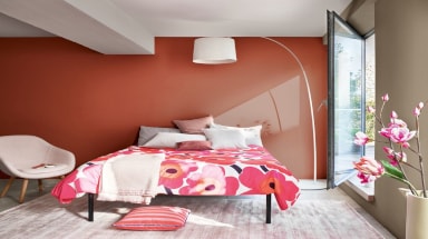 Dulux Red Coloured Bedroom With White Décor And Floral Bed