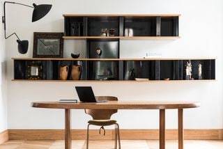 Dulux White Study With Black Accent Shelving And Wooden Décor