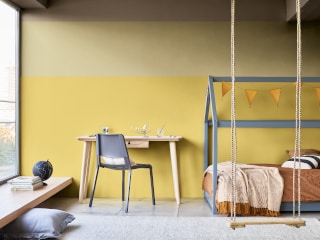 Two Tone Yellow Bedroom With Grey And Wooden Décor