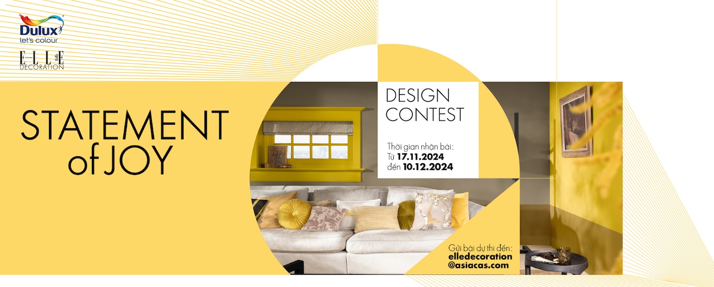 Căn phòng khách được sơn màu vàng phối cùng các gam màu nâu đất