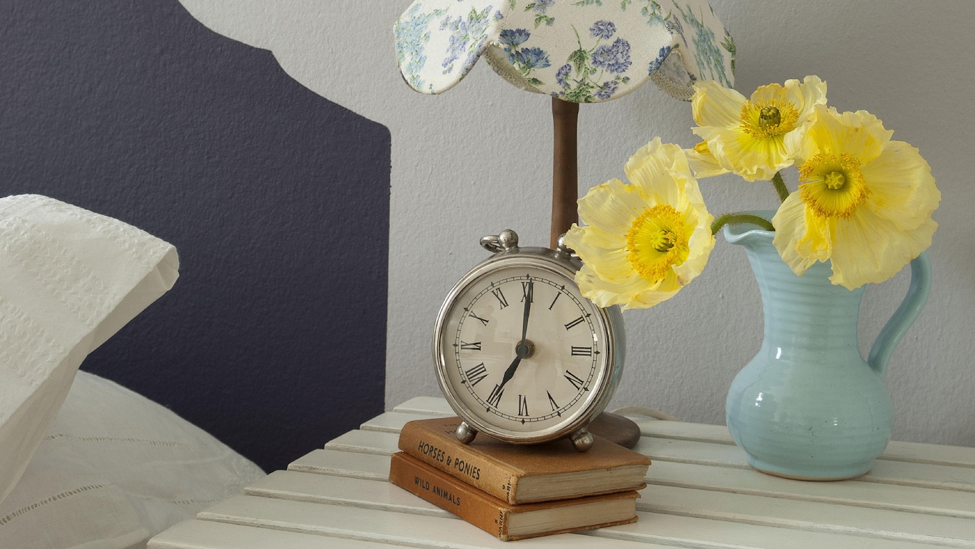 Add drama to pale lilac with deep purple + colours and products
