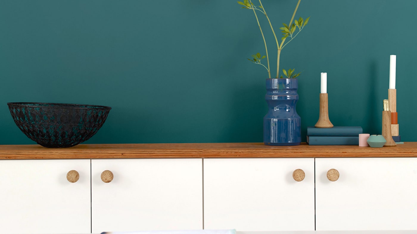 
White kitchen? For an easy kitchen design update, why not create a dramatic feature wall with majestic teal.
