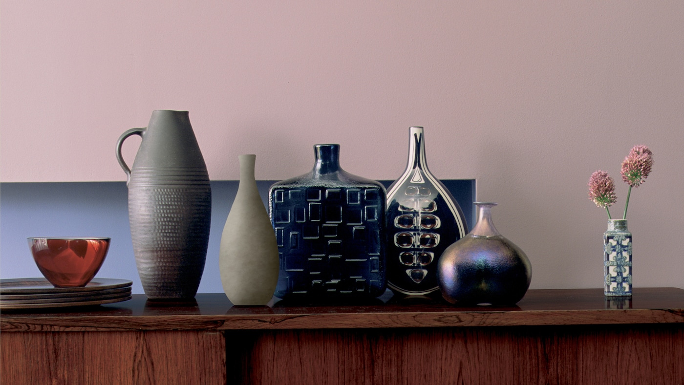 Contrast dusky pink with warm wood tones + colours and products
