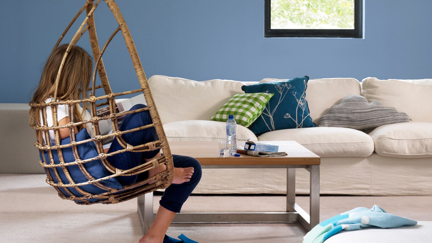 Relaxing in a stress-free blue living room. 