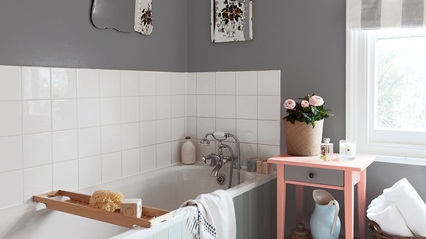 Turn your bathroom into a tranquil oasis with a warm grey colour scheme palette that exudes serenity.