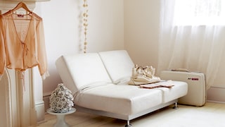 Create a cosy room with warm neutrals