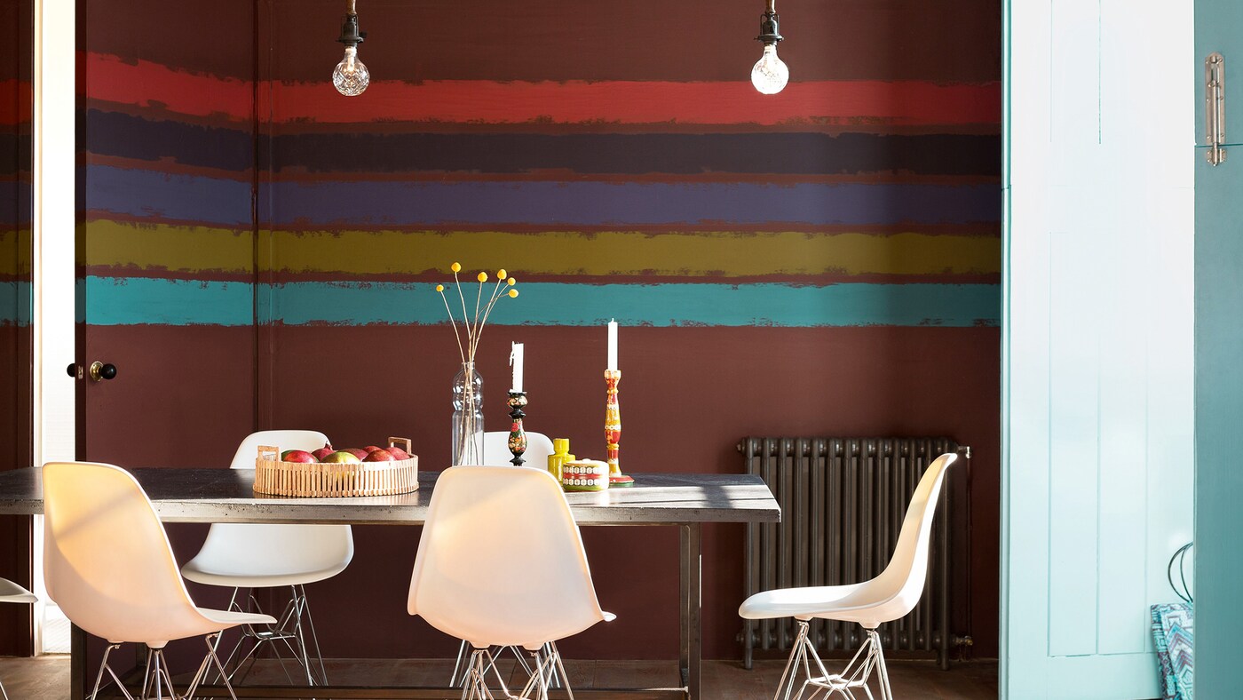 Painting stripes in varying sizes and colours is an easy way to transform your interior design. 