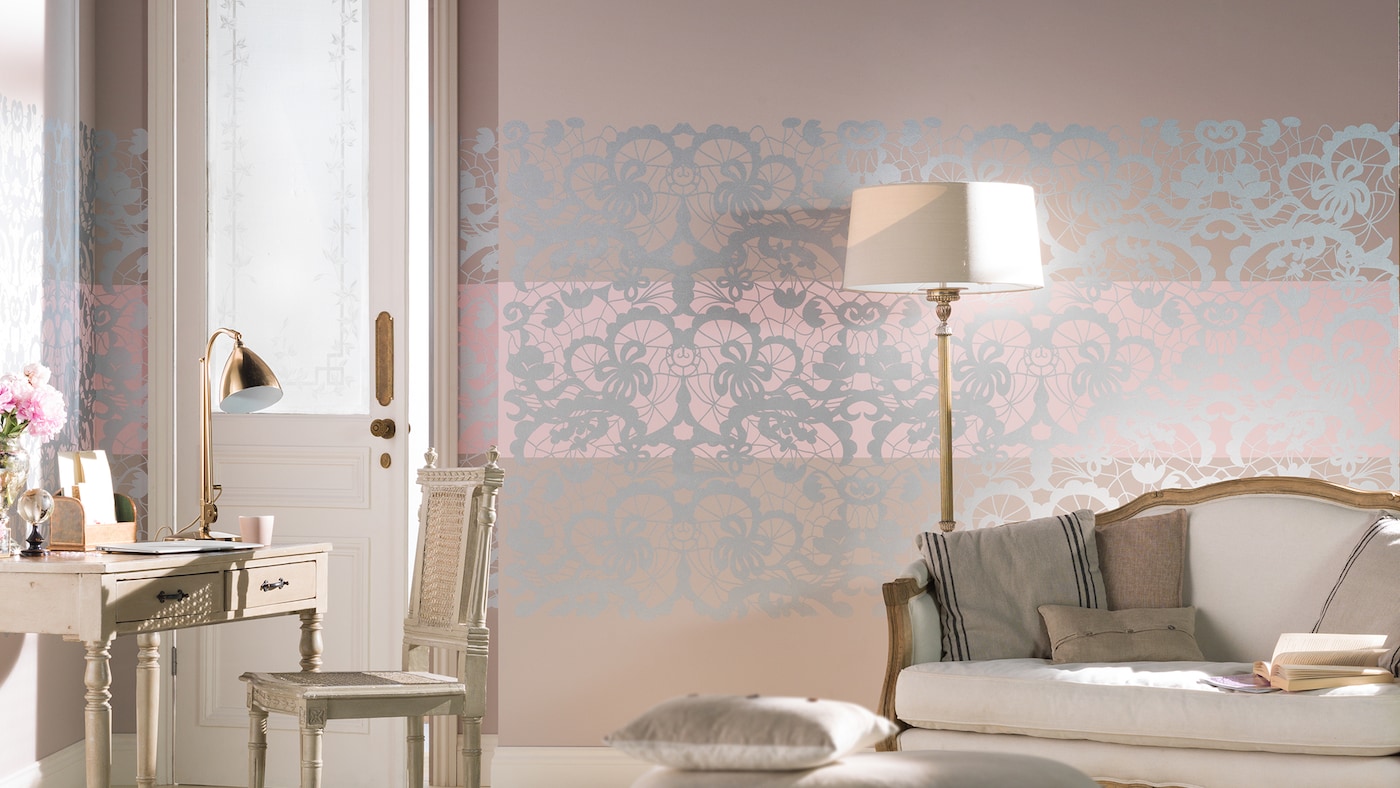 Five bedroom decor ideas to create a romantic retreat using lace stencils, drapes, rich paint colours, luxury fabrics and lighting.

