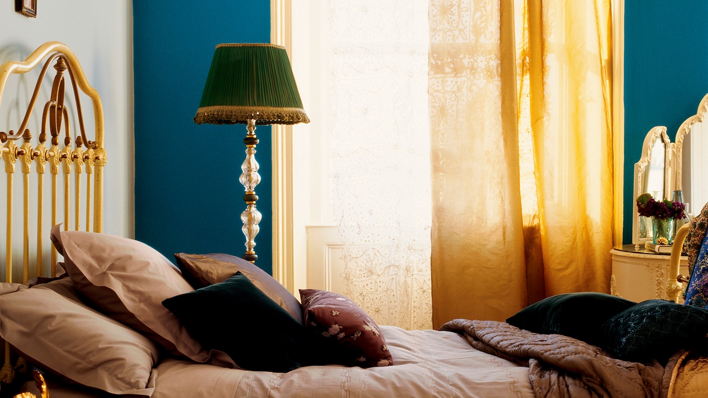 Inject a shot of glamour with deep teal + colours and products
