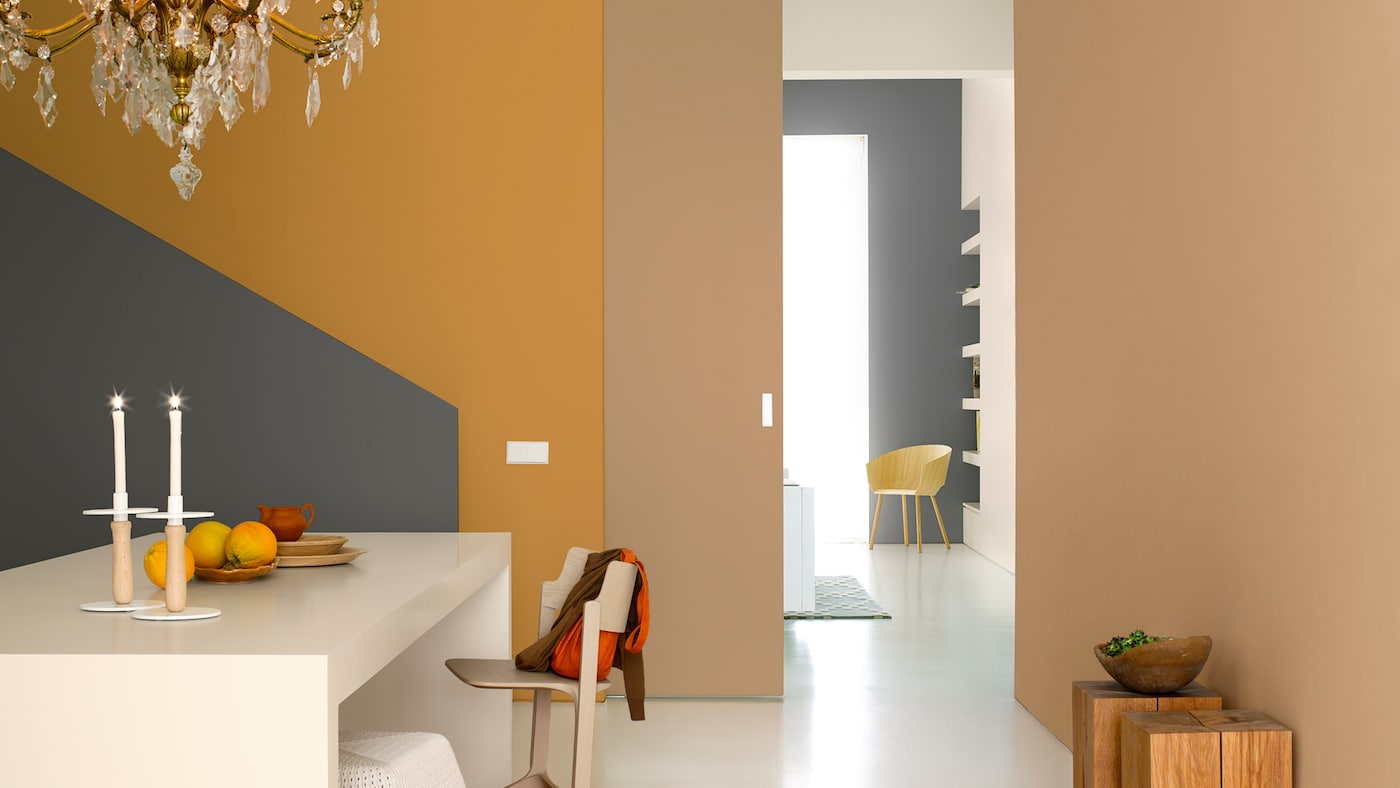 Orange shades mixed with a cool neutral palette will create a bold yet sophisticated look.