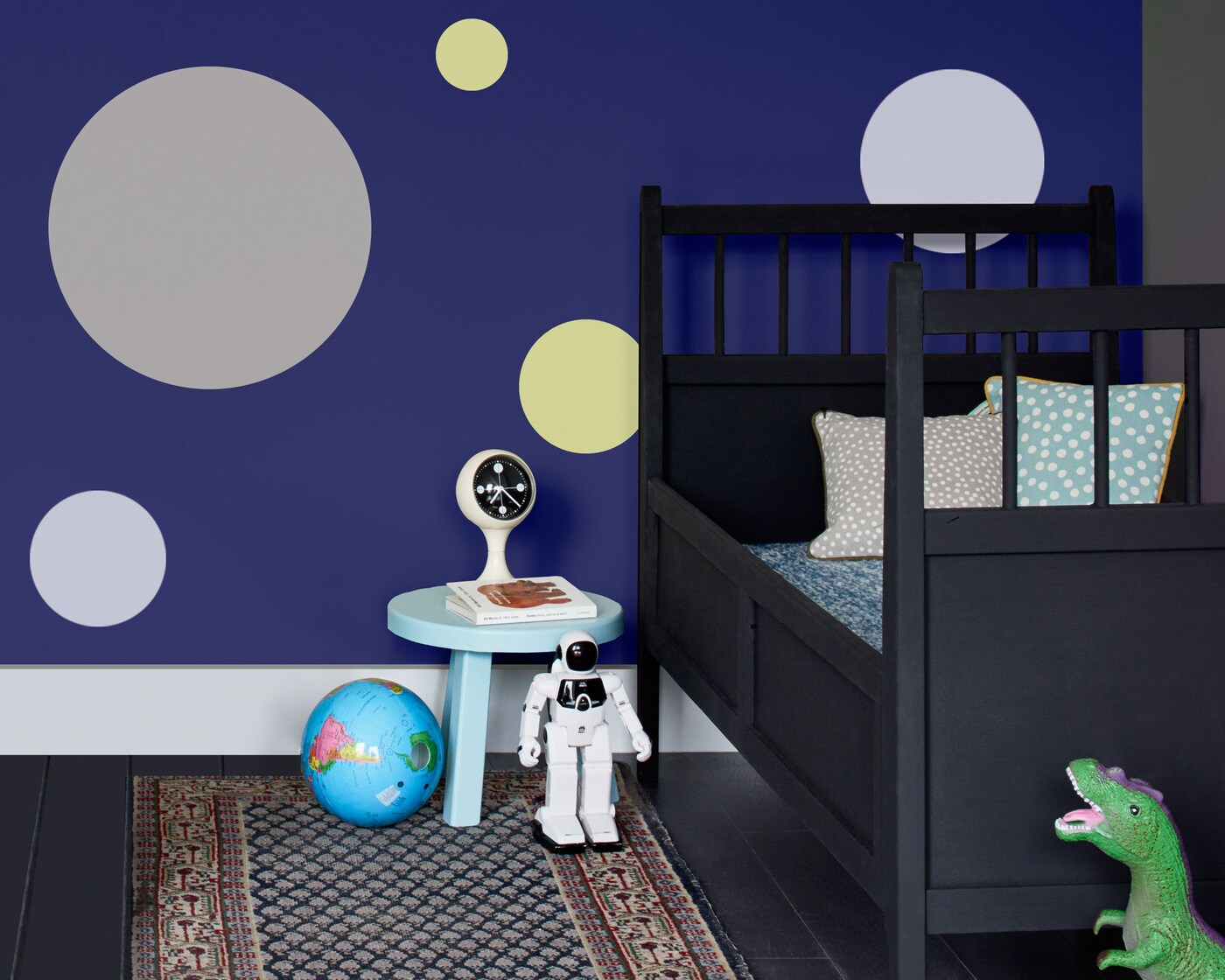 Use circles to create a space theme in your child’s bedroom