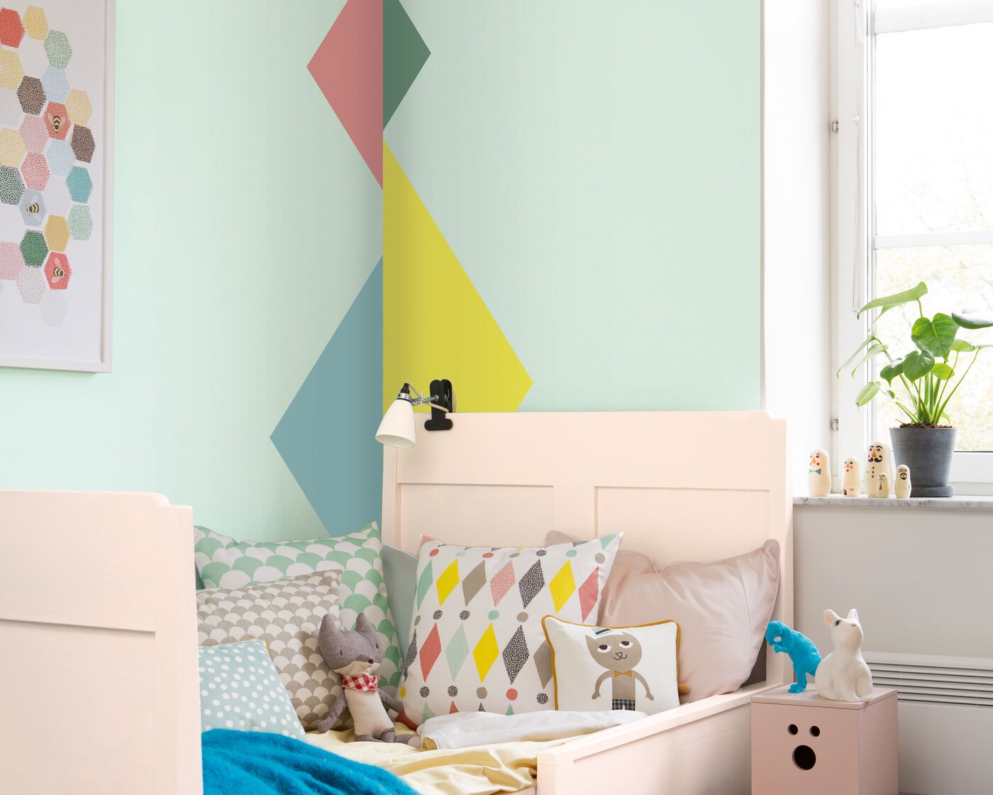 Paint geometric shapes to brighten up the corners of your child’s room