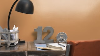 Add warmth to cool metal with orange