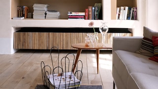 Exaggerate the depth of niche shelving