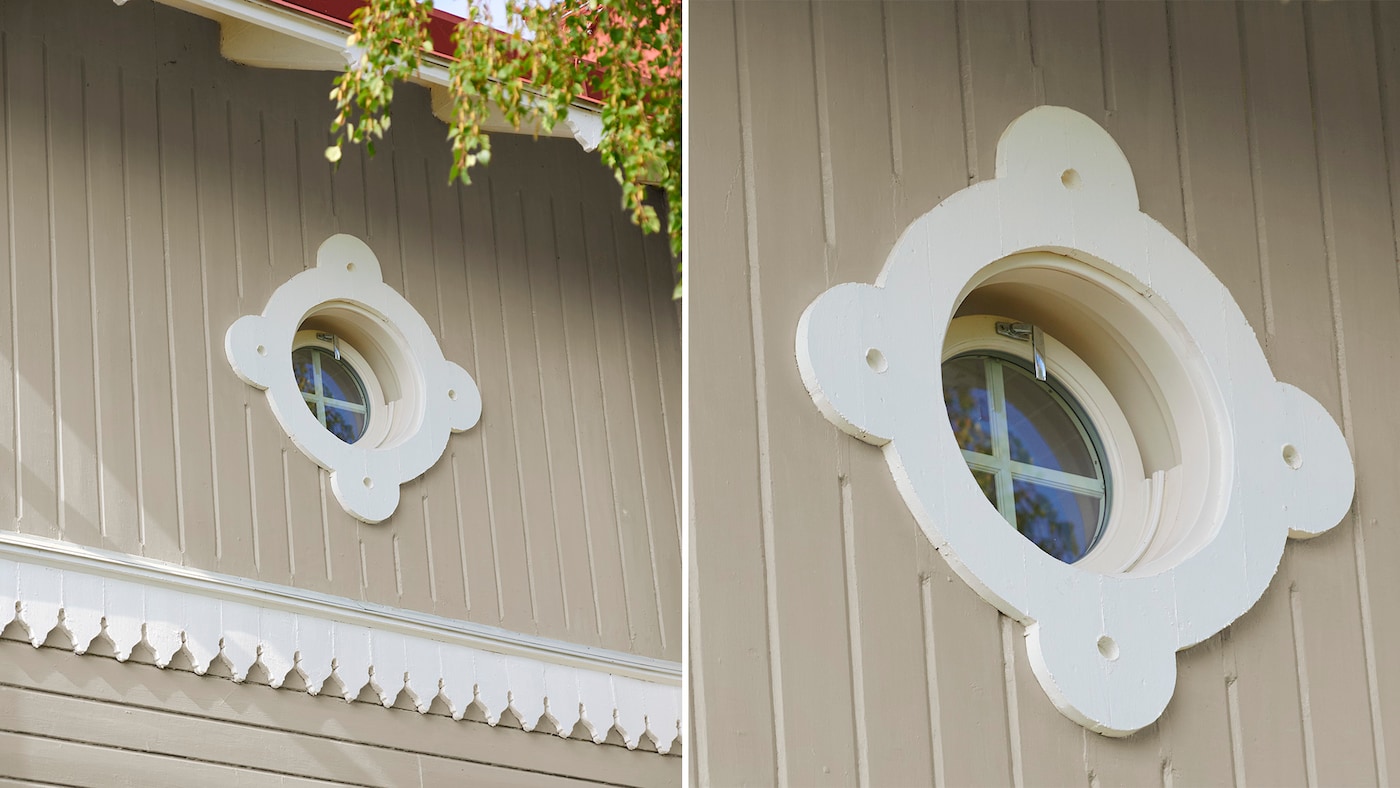 Beige husfarge og hvite detaljer og utskjæringer