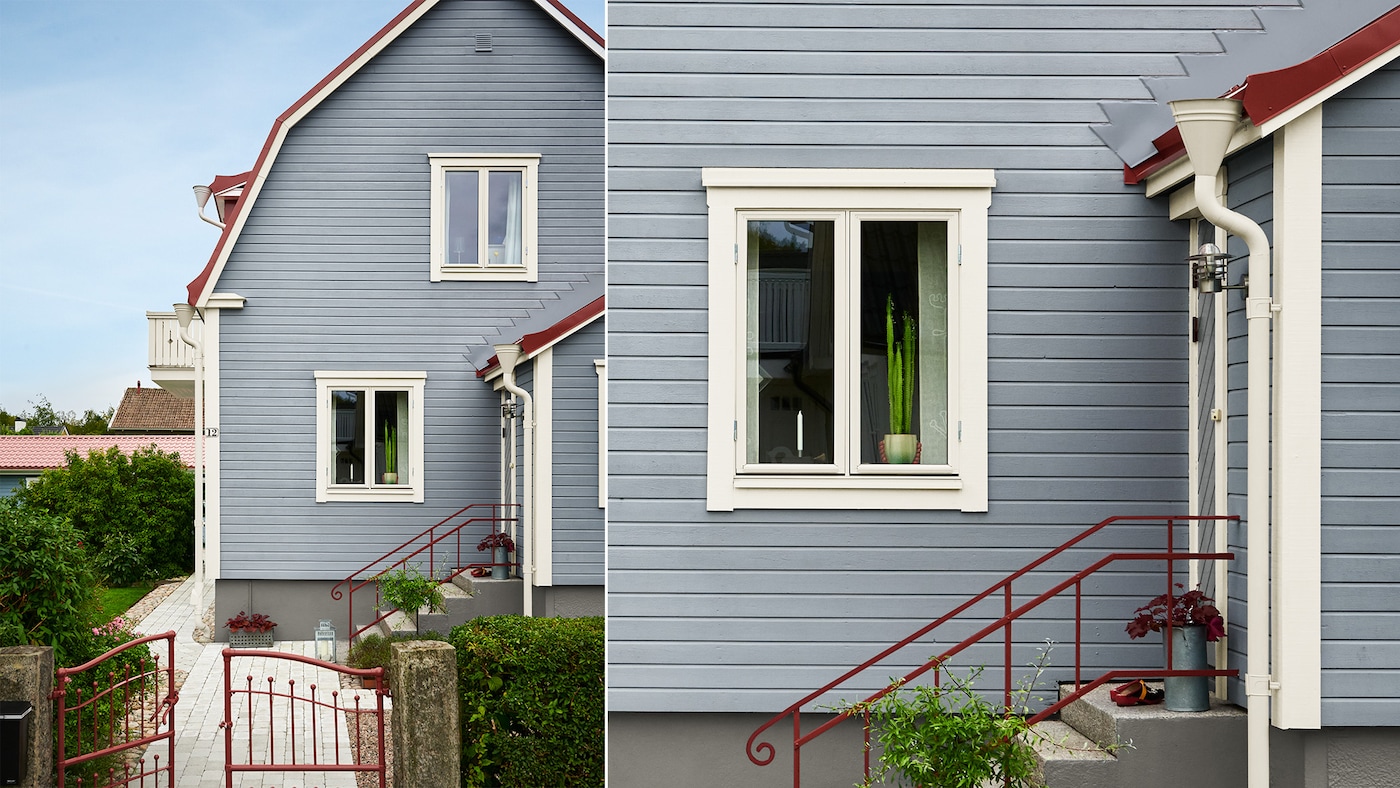 Blått hus med stor hage og rødt tak