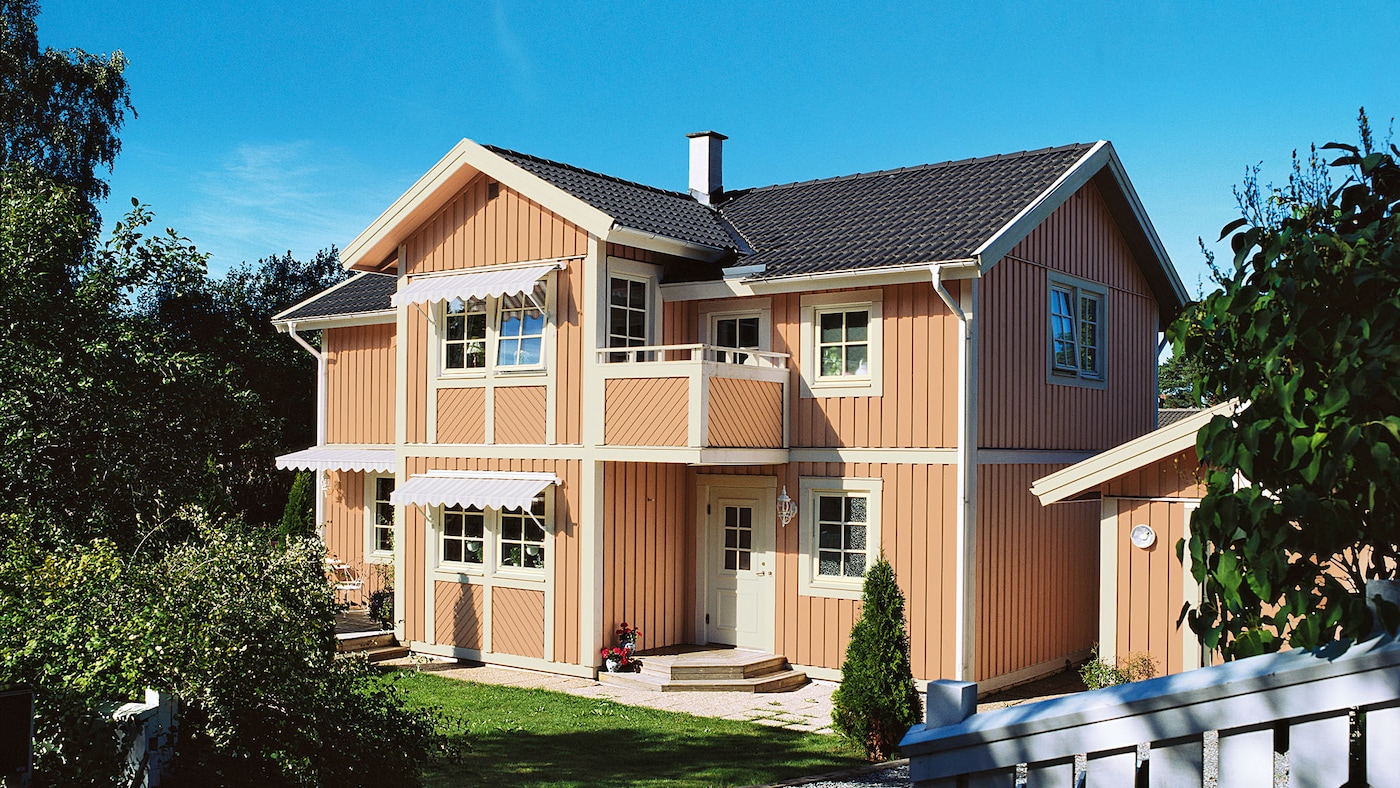 Fasad färgsatt i kulören Trä Gulröd 2