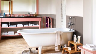 Use coral accents to brighten warm neutrals