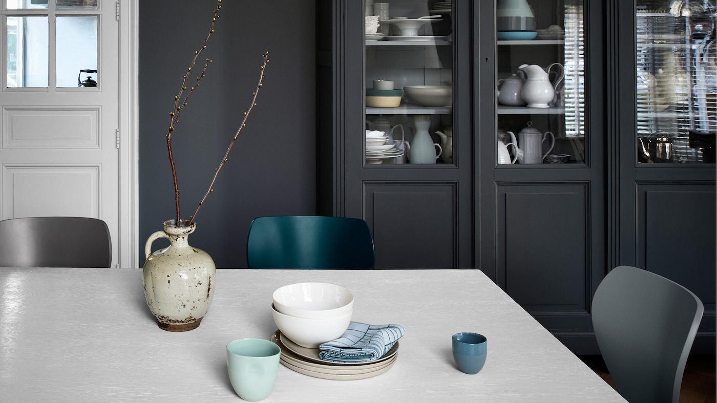 Dark colours have a reputation for being forbidding but they can actually be incredibly cosy.