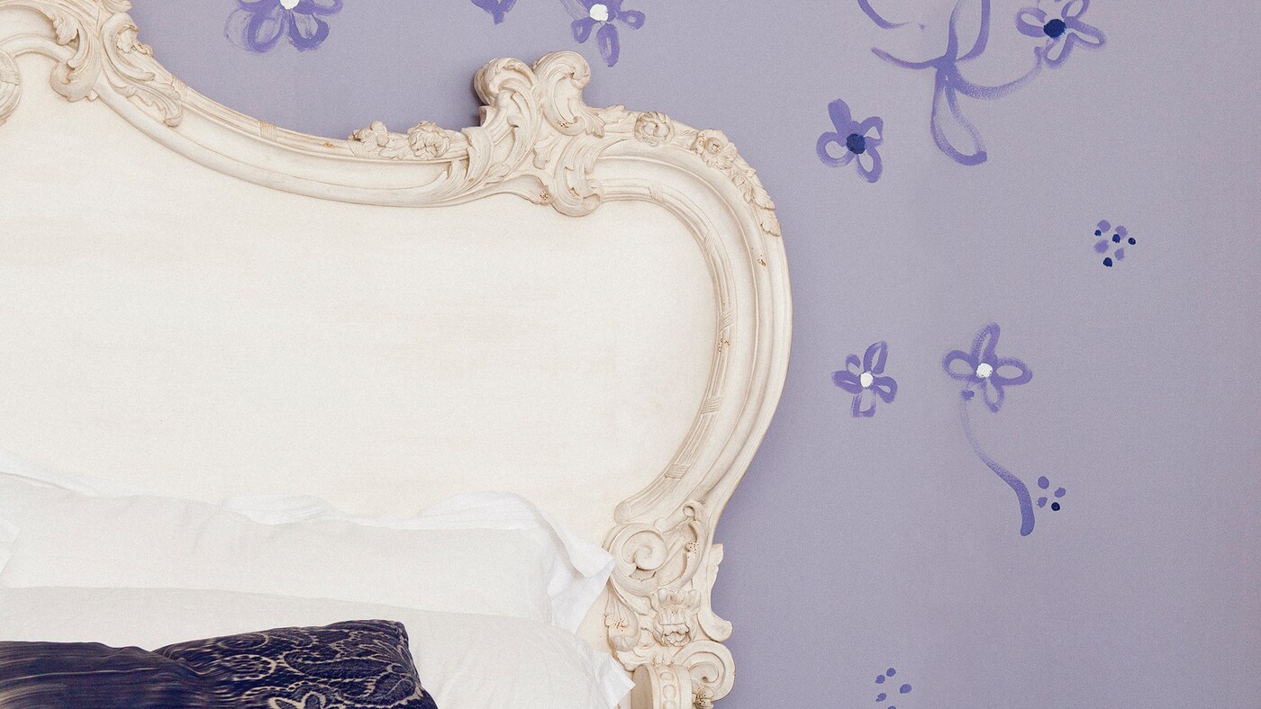 Feeling exhausted? Take time out and relax in a room covered in a comforting shades of light purple.