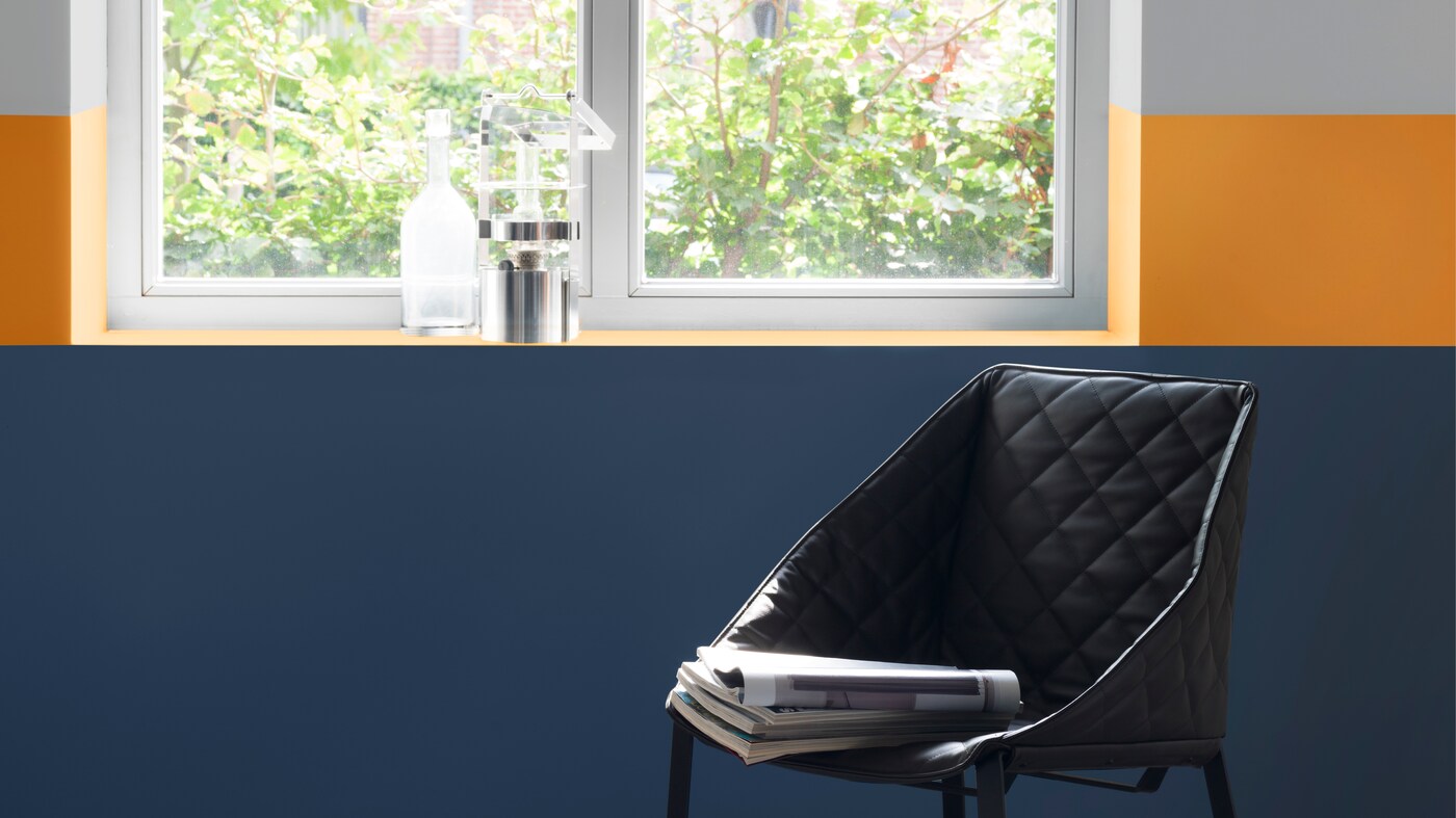 If you like to be a bit more daring with your decorating, take two starkly contrasting shades and use them to create a definite divide between your different living zones. 