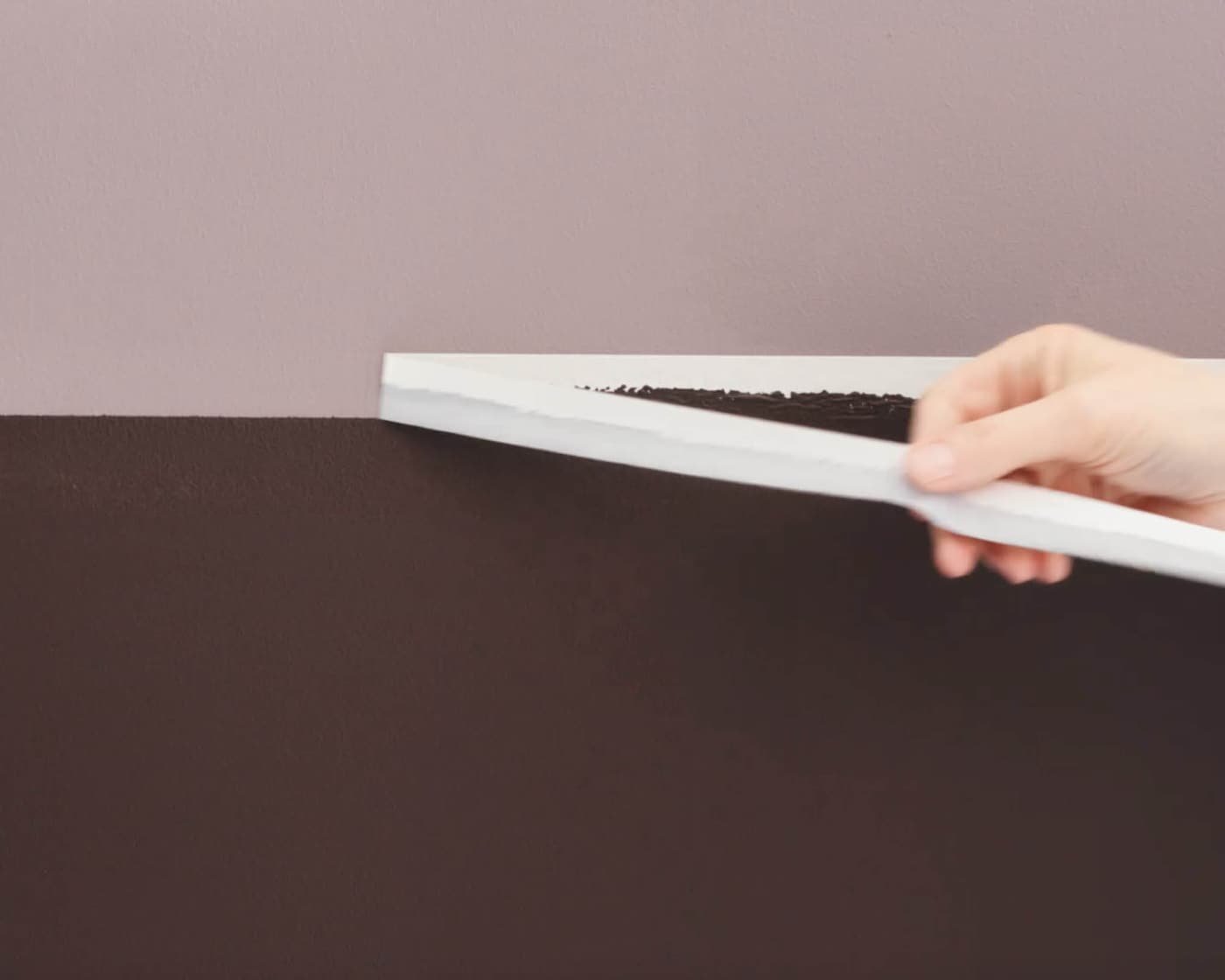 Remove the masking tape to unveil your completed two-tone wall