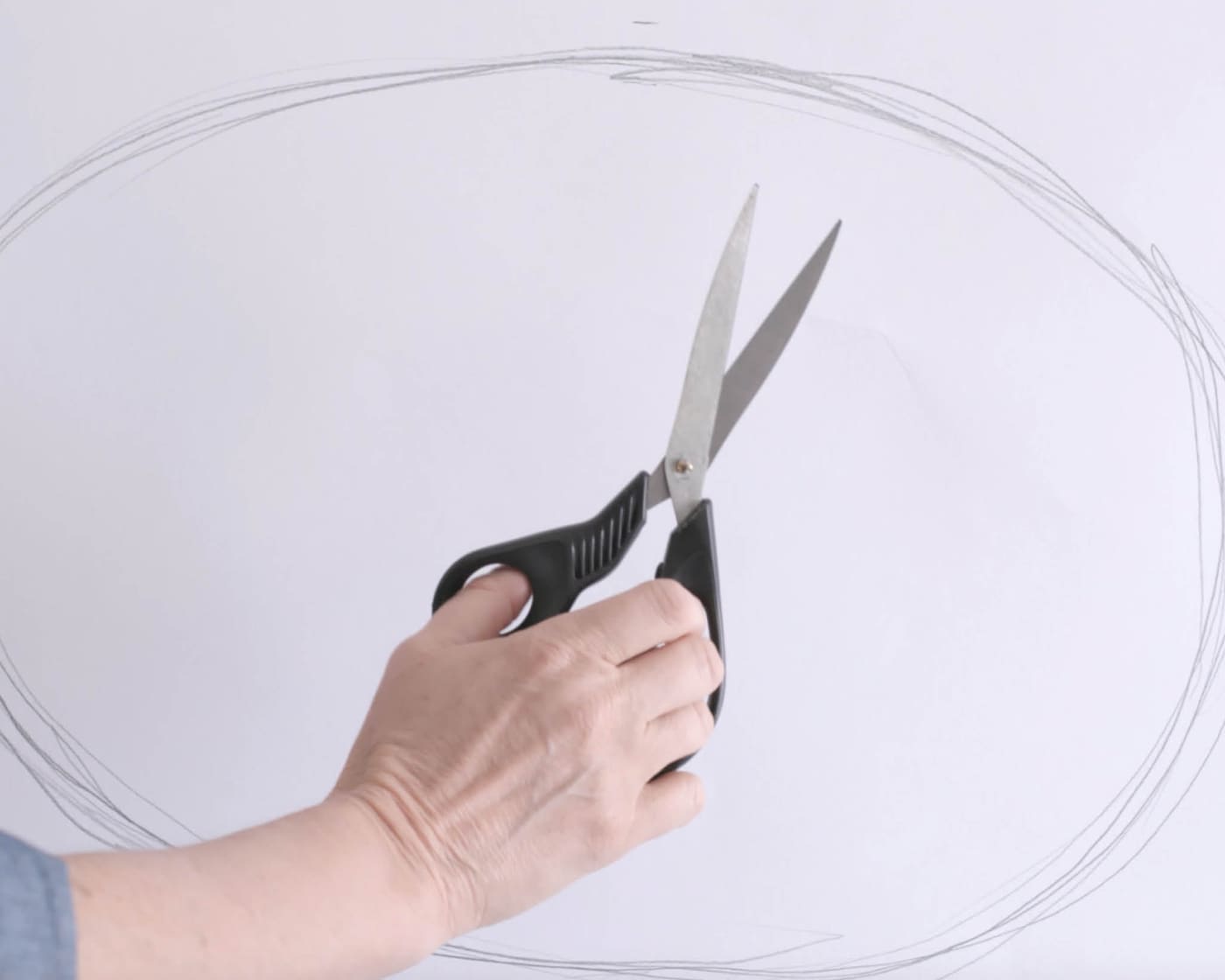 Draw your oval shape on paper and cut it out