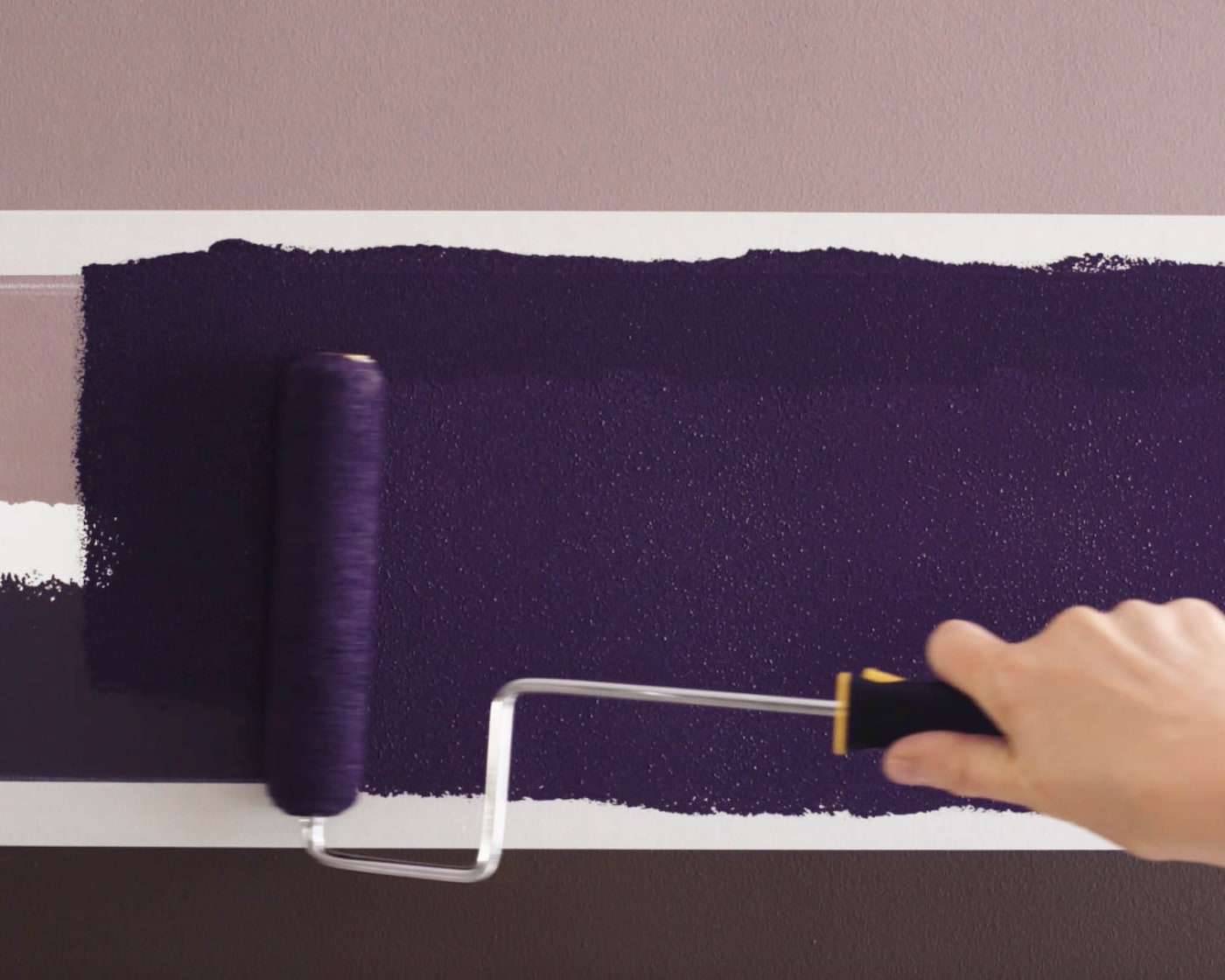 Paint between your taped lines with a small roller