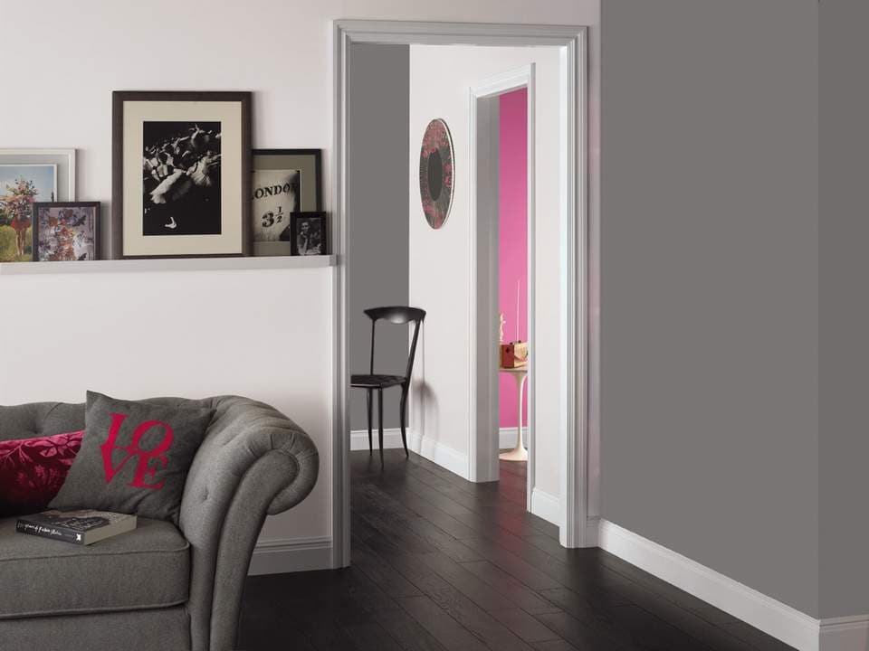 Bold orange with dark gray in the living room 