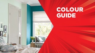 Modern interior room with teal accent wall and white furnishings featuring "Colour Guide" text on a red geometric overlay design.