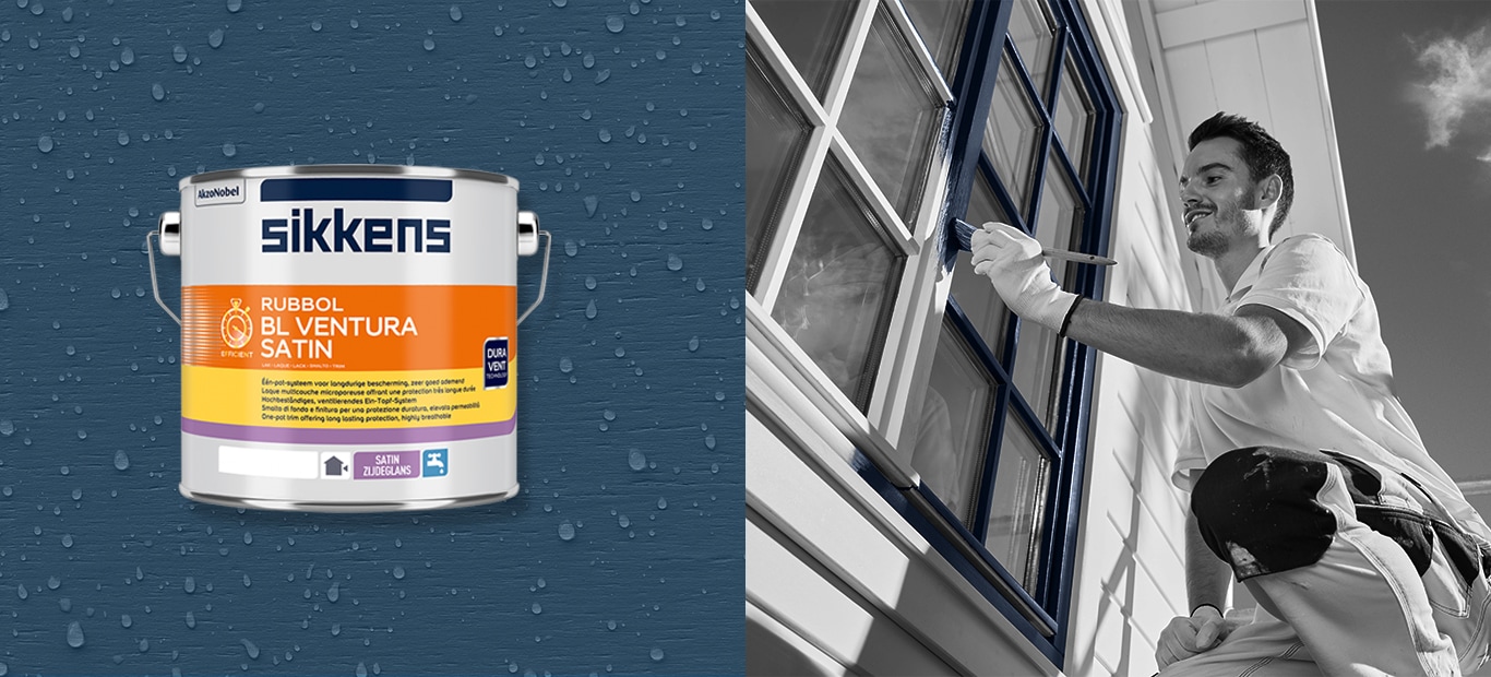 Schilder die buiten houten ramen lakt