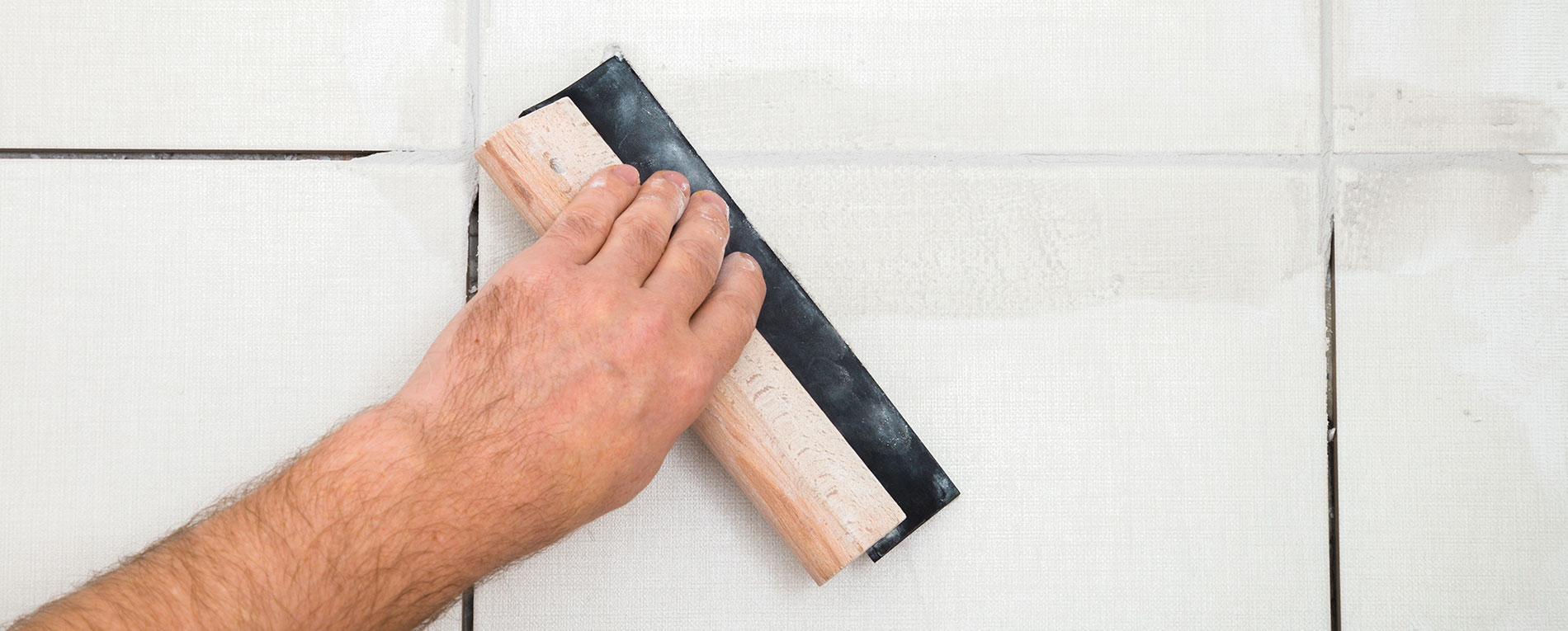 Repairing and filling a tiled surface